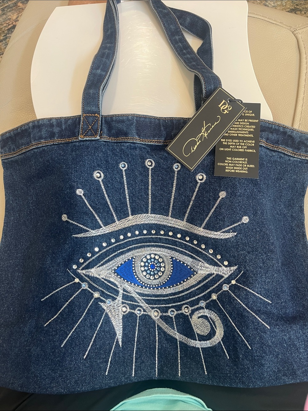 DG2 by Diane Gilman Dark Blue Denim Eye Embellished Tote (brand new in bag)
